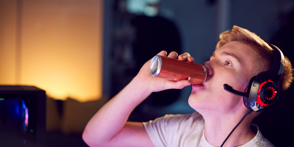 Teen drinking caffeinated drink