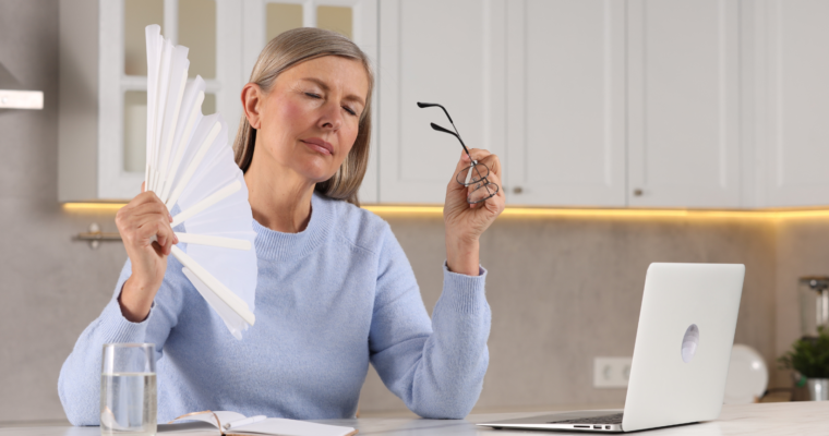 menopause woman with fan