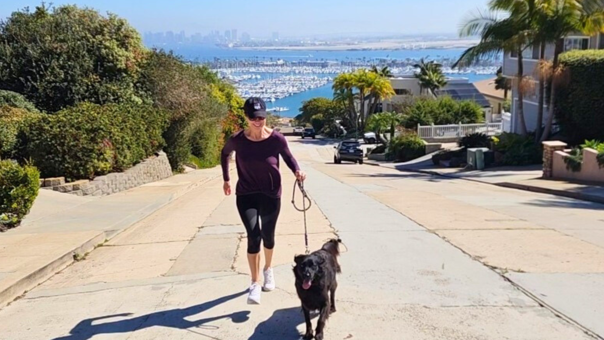 running on hill with dog